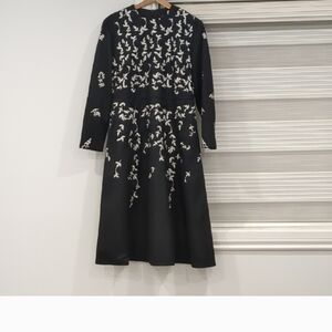 Chic Black Long Sleeve Dress with White Floral Design